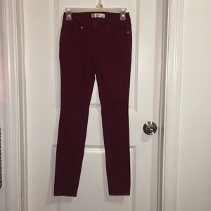 Burgundy jeans.